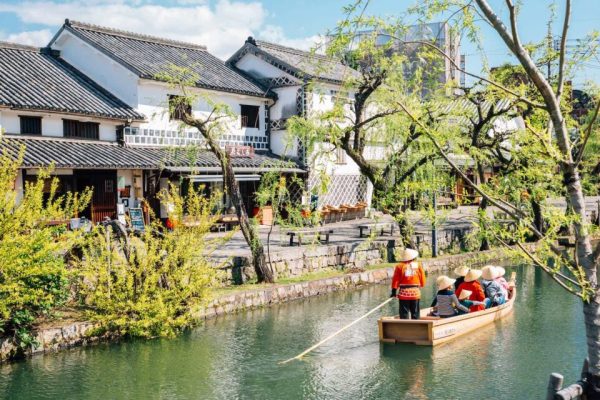 Okayama, Japan - April 15, 2019 : Old boat on canal at Kurashiki Bikan Historical Quarter